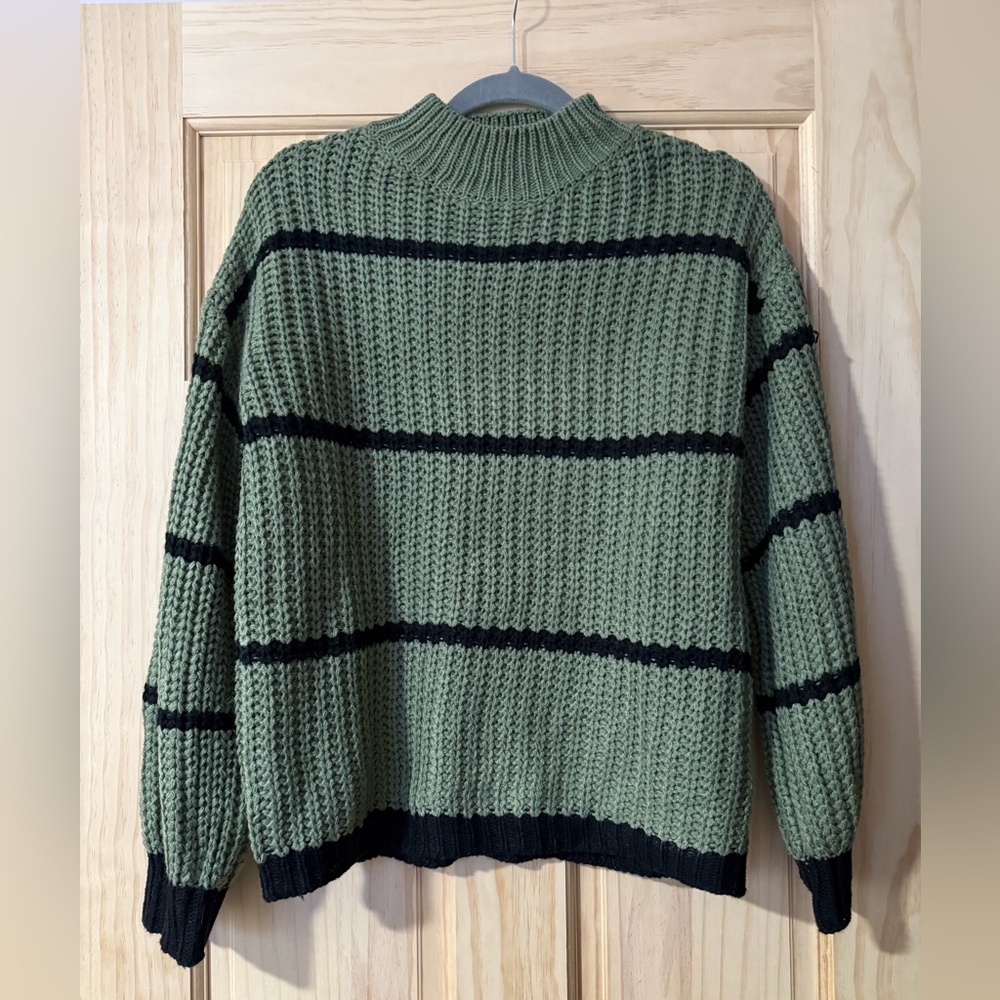 Women’s green and black striped sweater